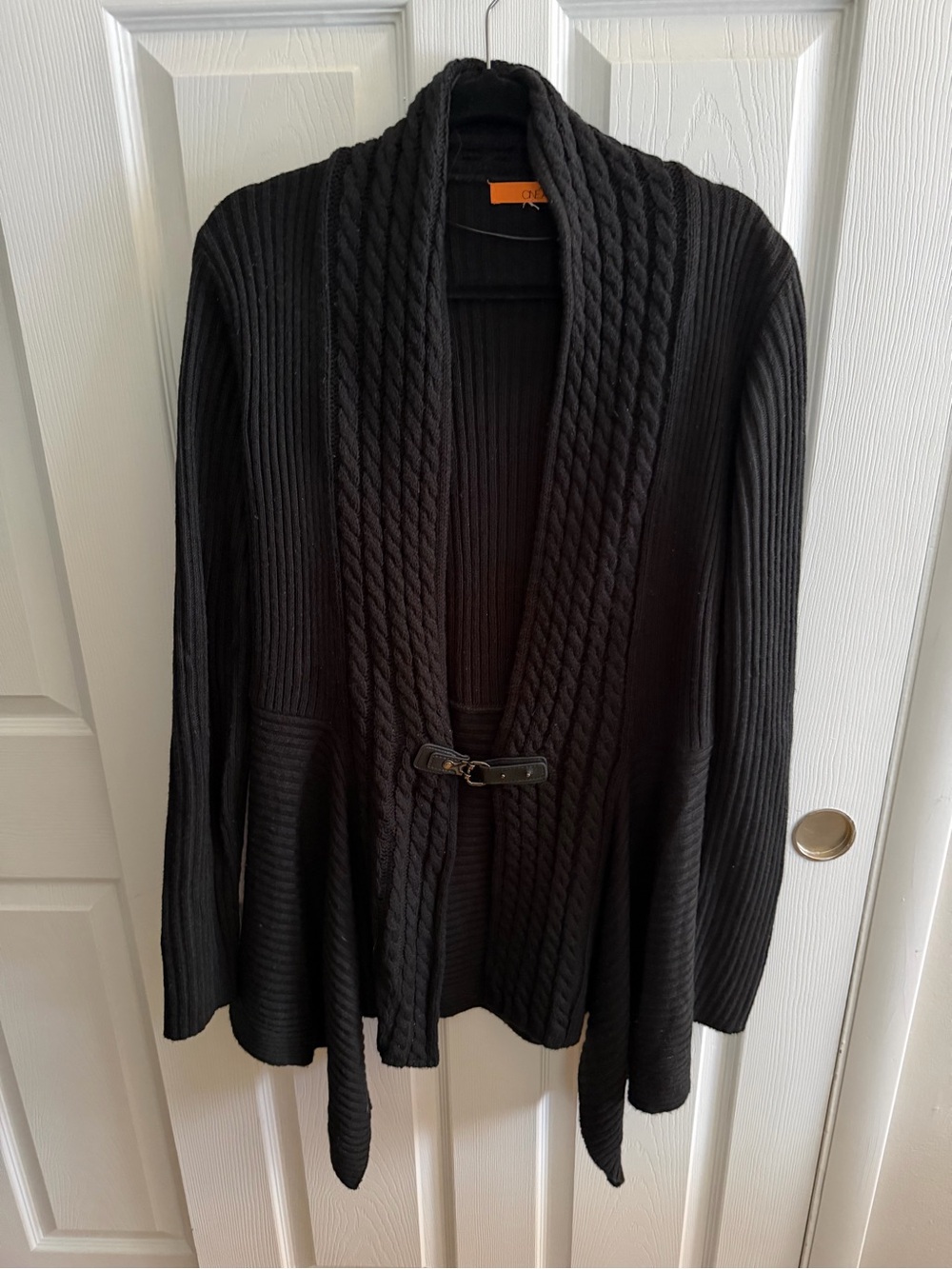 Cozy Black Shawl-Collar Cardigan with Buckle Closure and handkerchief edge